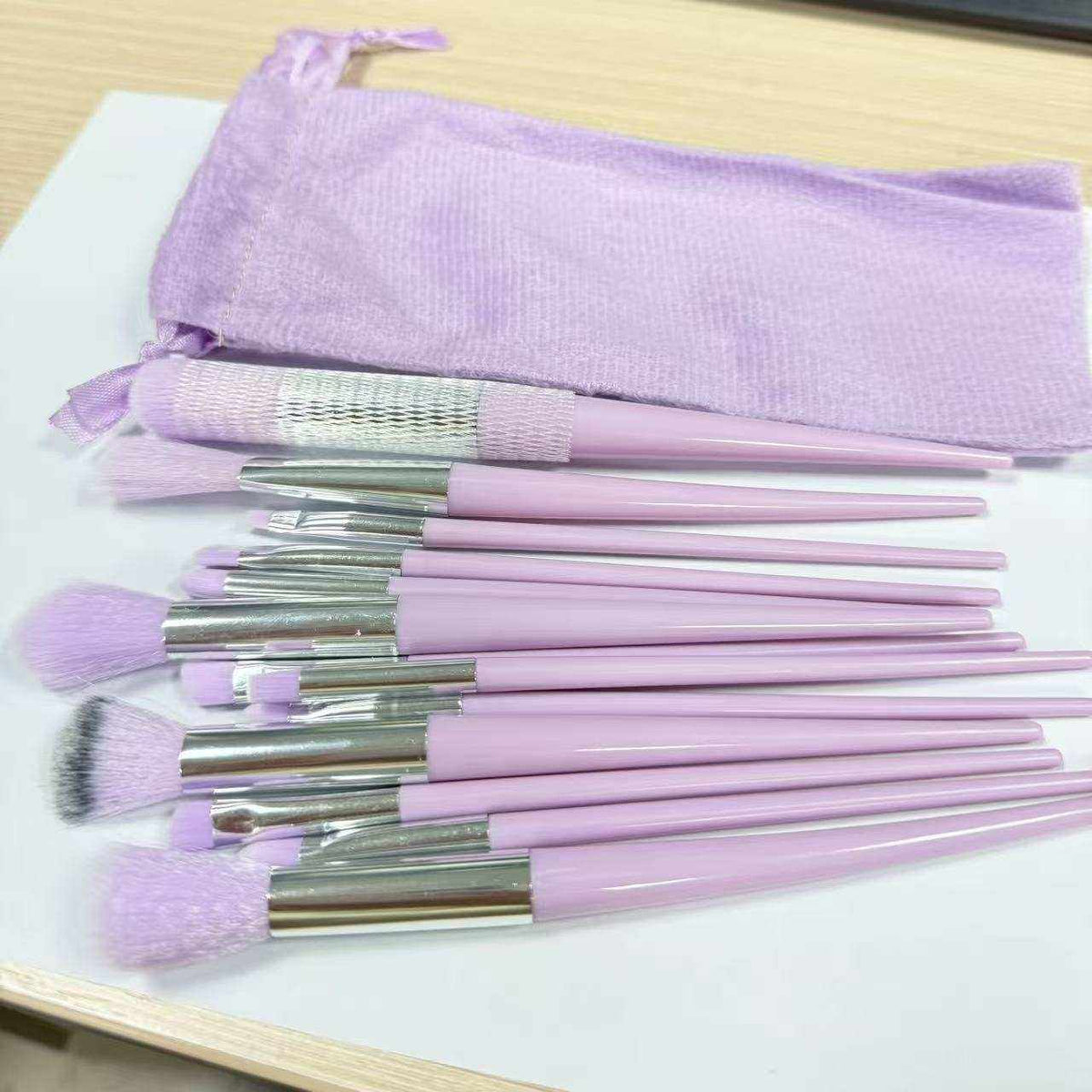 Makeup application brushes in satin pouch