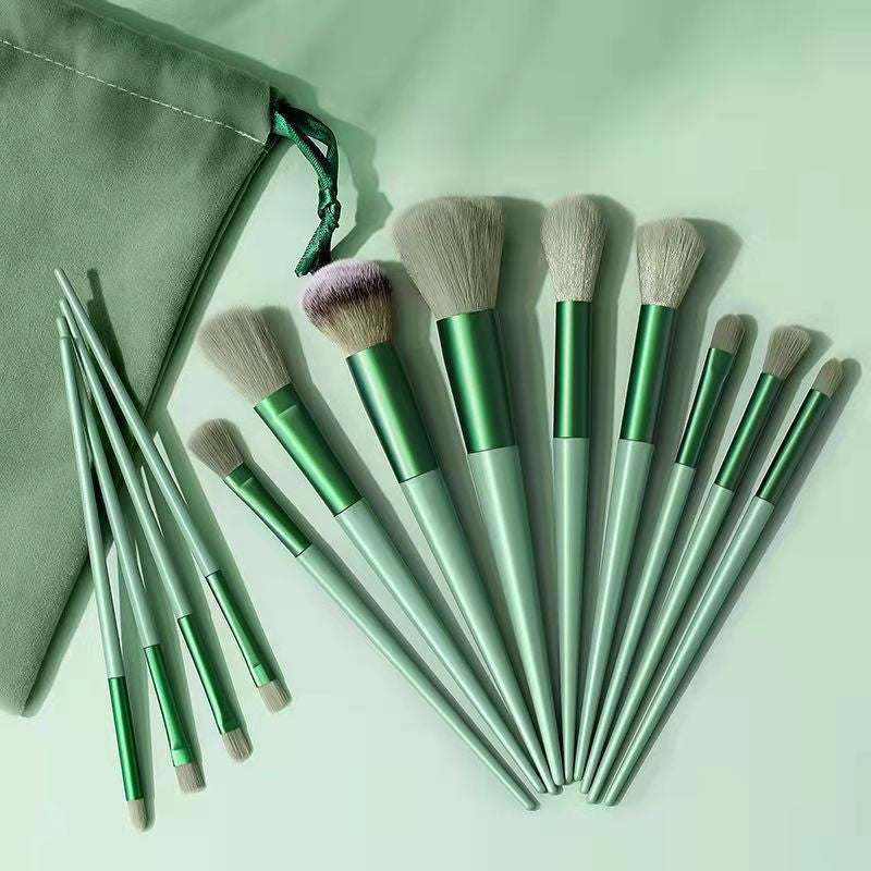 13-piece makeup brush set with satin pouch.