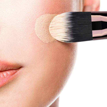 16-Piece Makeup Brush Set with soft nylon bristles applying beige foundation on smooth skin, close-up detail brush strokes