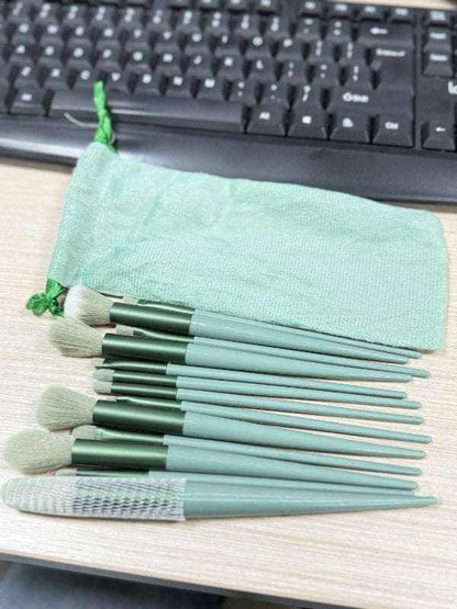 Cosmetic brush kit with elegant satin storage pouch