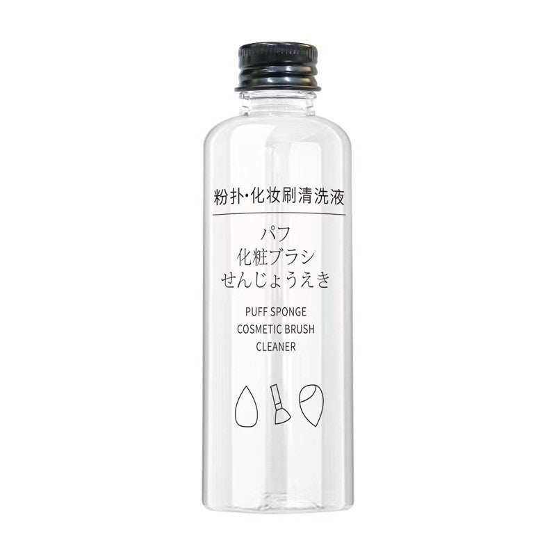 Clear plastic bottle of liquid makeup brush and sponge cleaner with black screw cap and Japanese text label for an Automatic Makeup Brush Cleaner