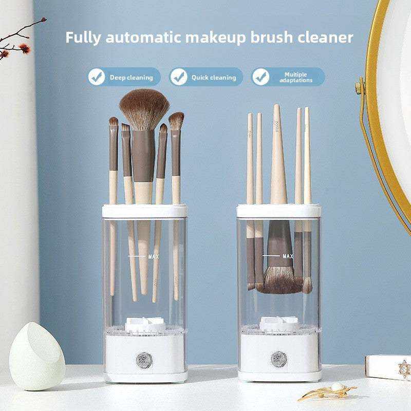 Automatic Makeup Brush Cleaner in white with clear container holding various makeup brushes with wooden handles and soft bristles, designed for deep and quick cleaning