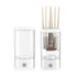 Automatic Makeup Brush Cleaner in white plastic with clear water reservoir and several makeup brushes inserted for cleaning