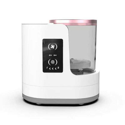 Makeup Brush Cleaner electric device in white with transparent pink lid and digital control panel for automatic brush cleaning and drying